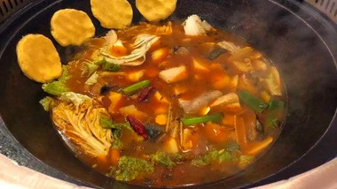九味一品铁锅炖（和信广场店）的图标