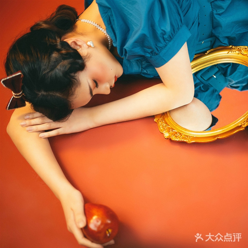 沐稷社复古写真摄影馆的图标