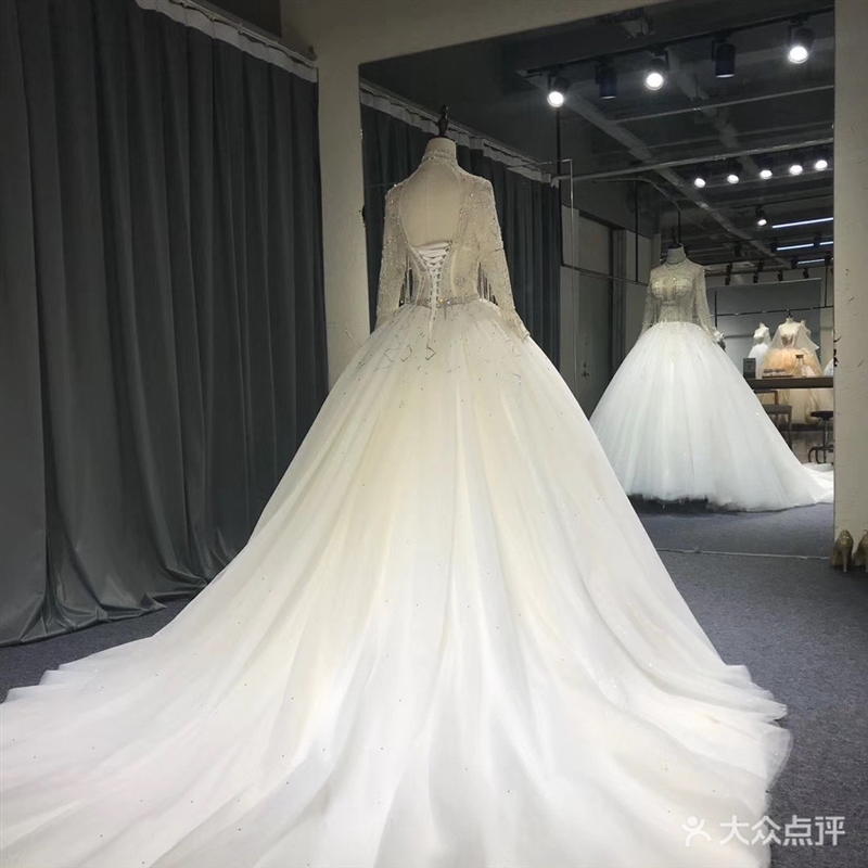 米提婚纱坊高端私人定制的图标